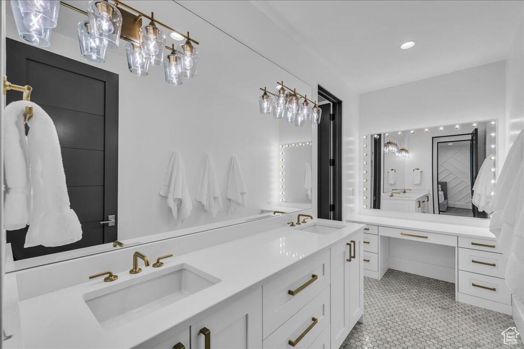 Bathroom featuring double vanity