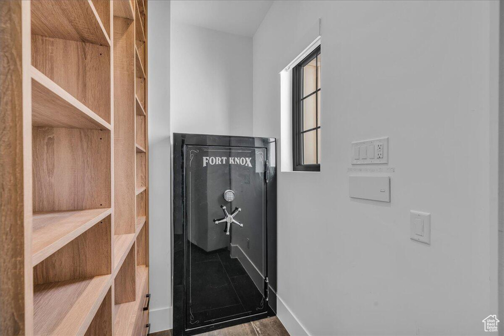 Corridor featuring baseboards