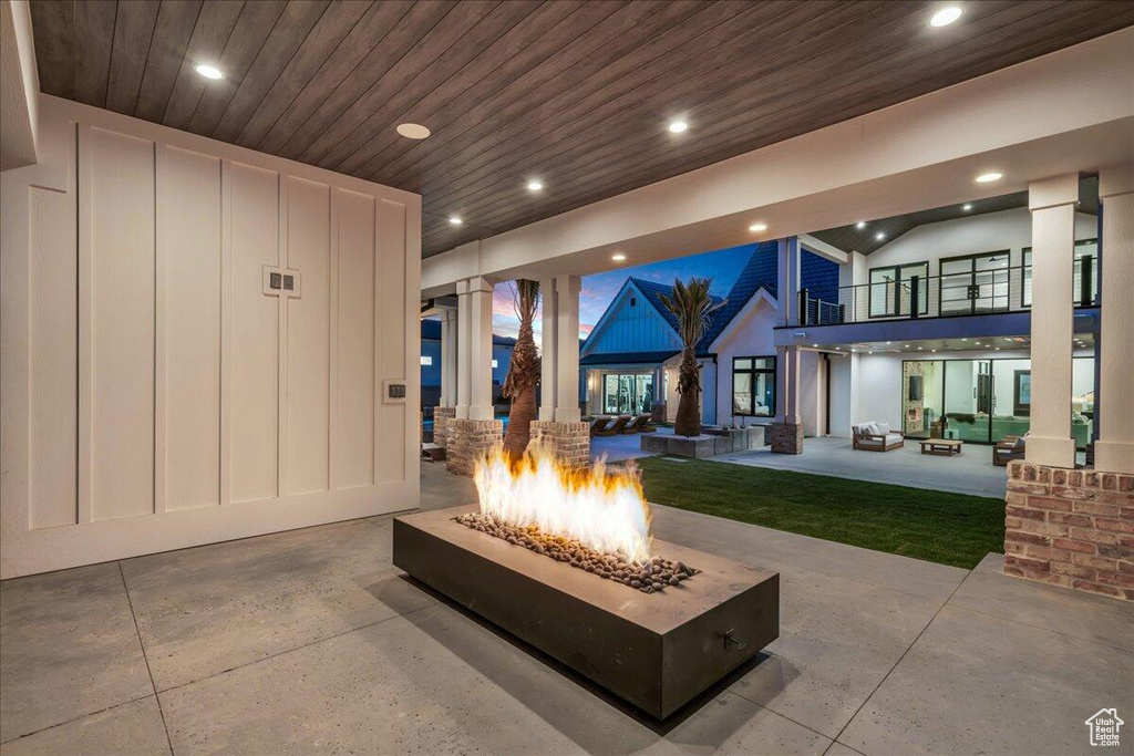 Building lobby featuring recessed lighting and wood ceiling