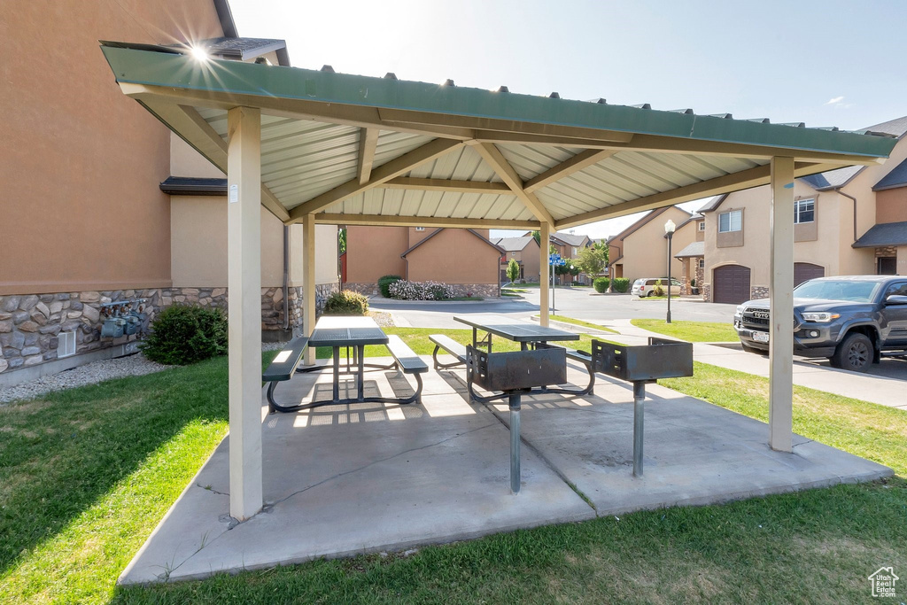 View of patio / terrace with a gazebo and a residential view