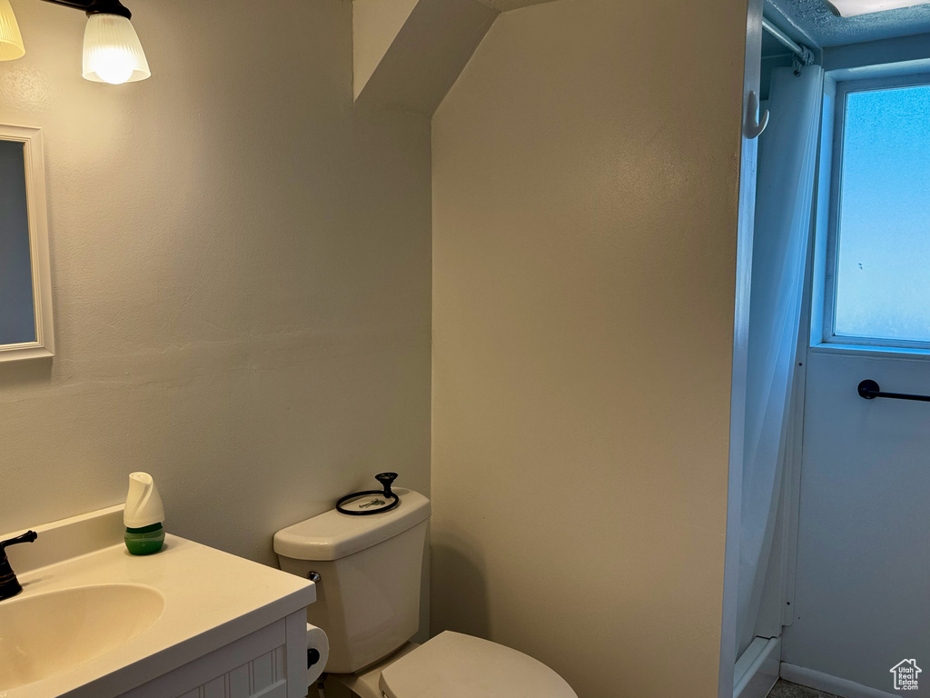 Bathroom with vanity and a shower with curtain