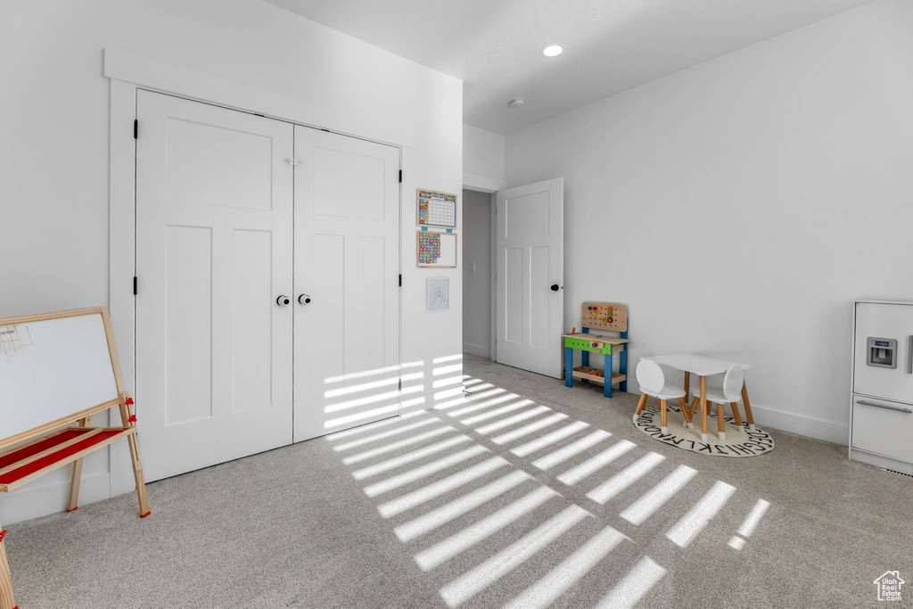 Game room featuring carpet flooring and recessed lighting