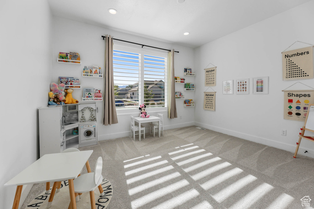 Game room featuring carpet floors and recessed lighting