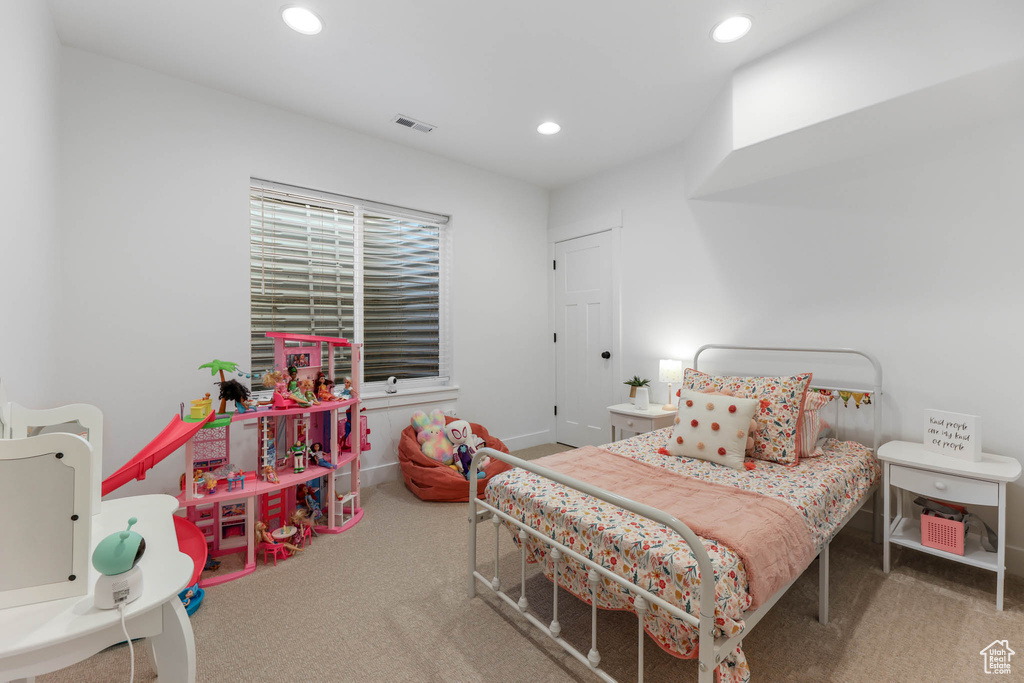 Bedroom with carpet flooring and recessed lighting