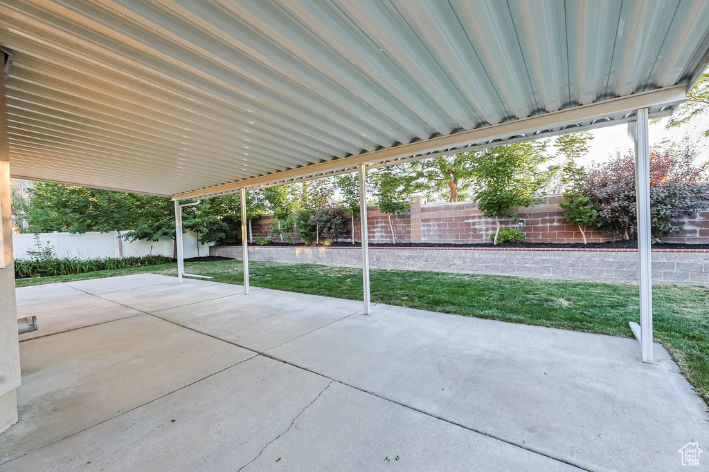 Fenced backyard featuring a patio area