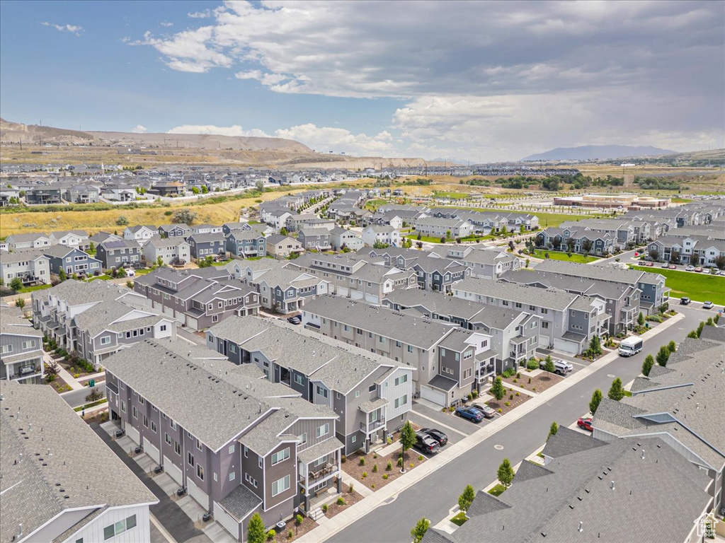 Aerial view of residential area featuring mountains