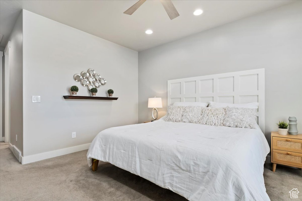 Bedroom featuring carpet, ceiling fan, and recessed lighting