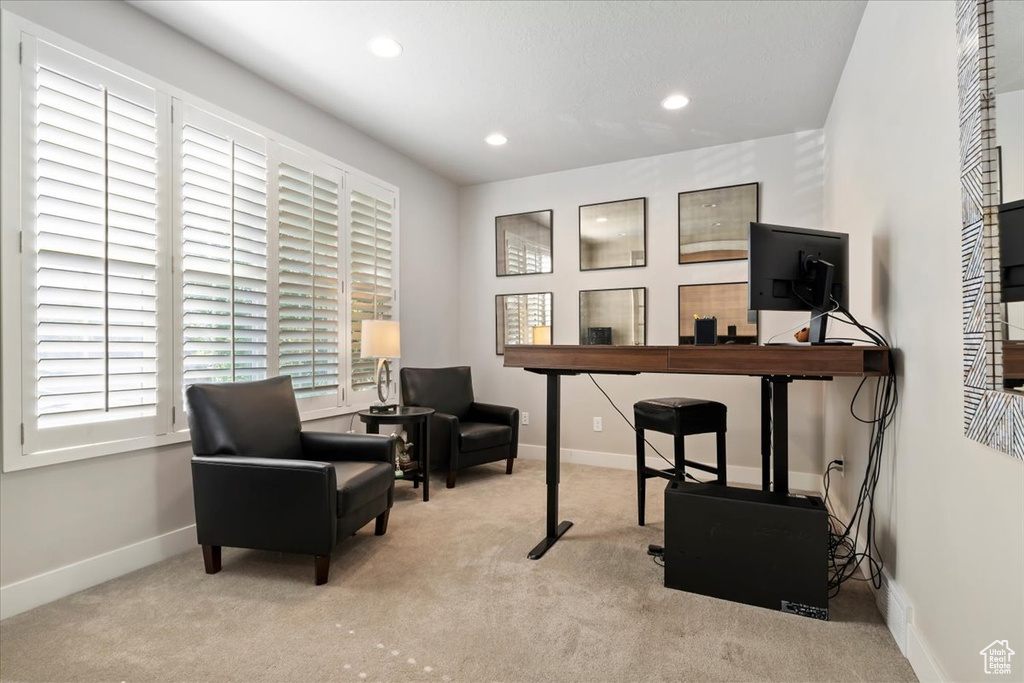Office area featuring carpet floors and recessed lighting