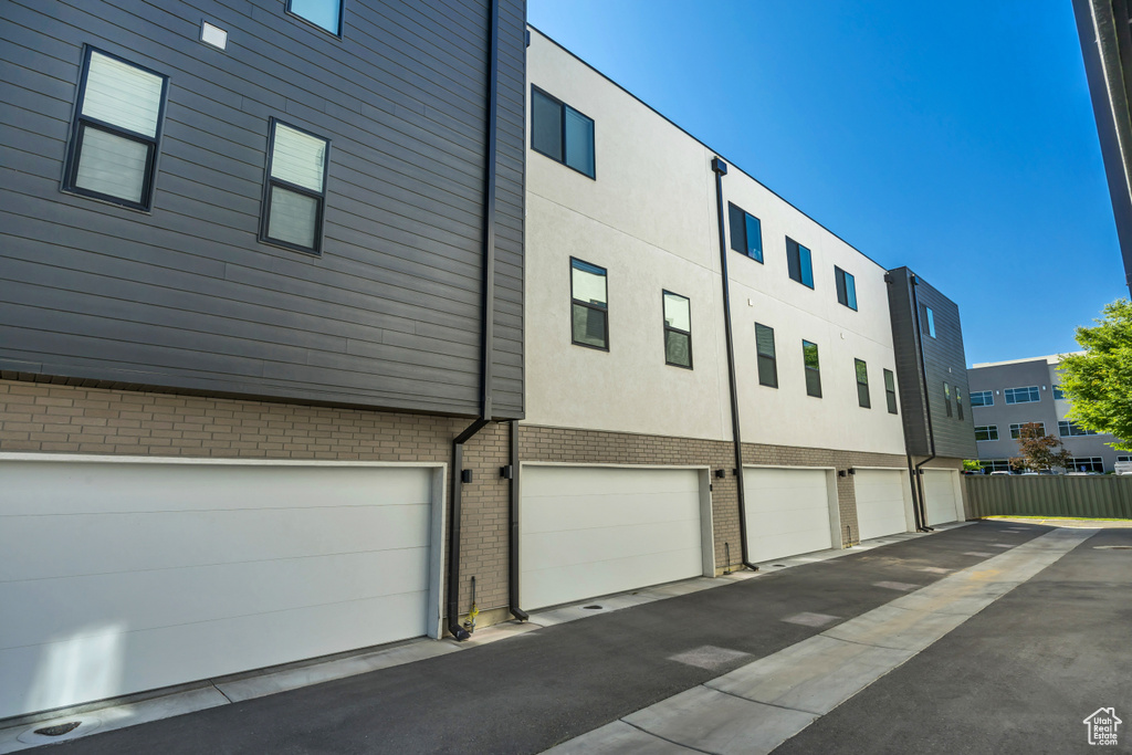 View of property featuring an attached garage