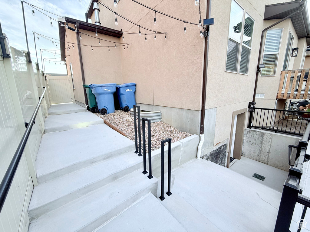 View of patio with a gate
