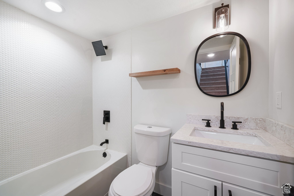 Full bathroom featuring vanity and  shower combination