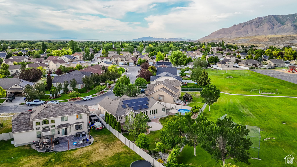 Aerial view of residential area with a mountain backdrop
