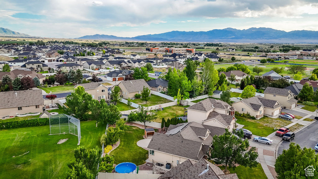 Aerial view of residential area with a mountain backdrop