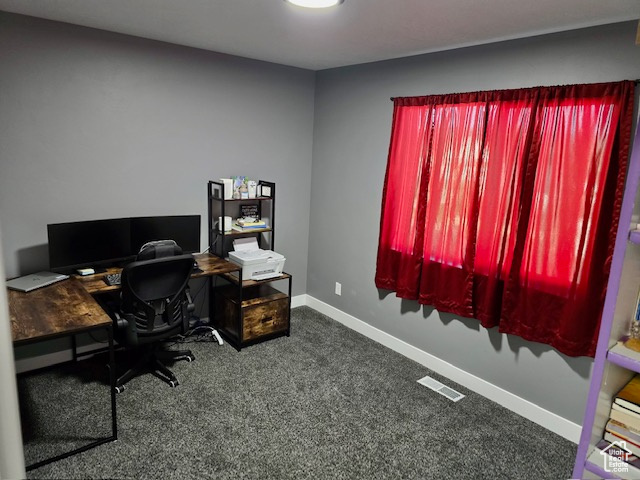 Office area with carpet and baseboards
