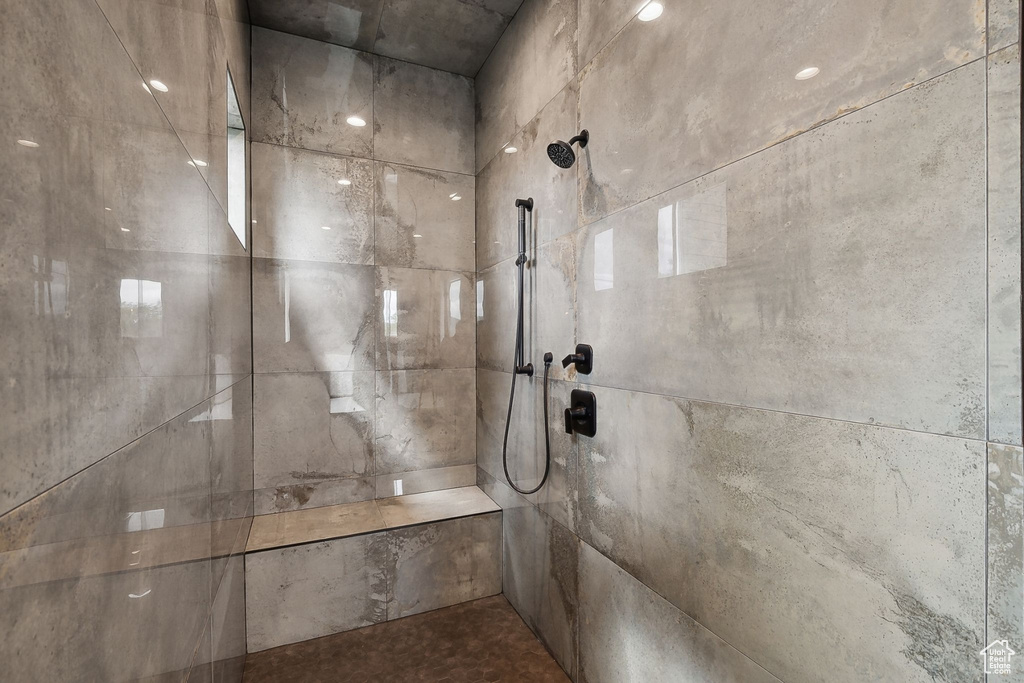 Bathroom with a tile shower