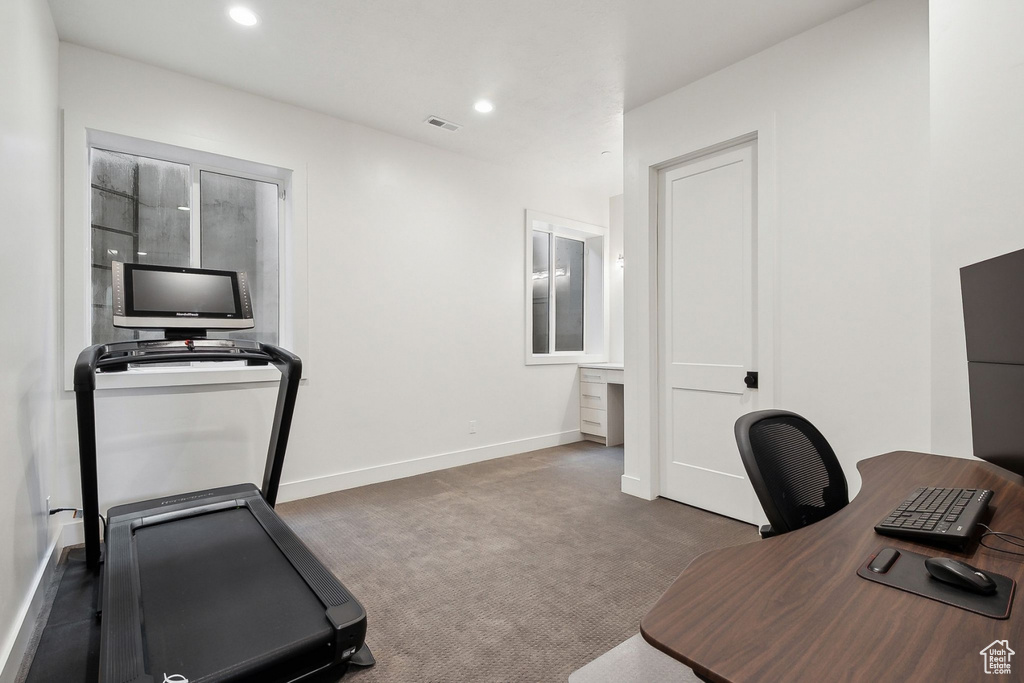 Unfurnished office with carpet floors and recessed lighting