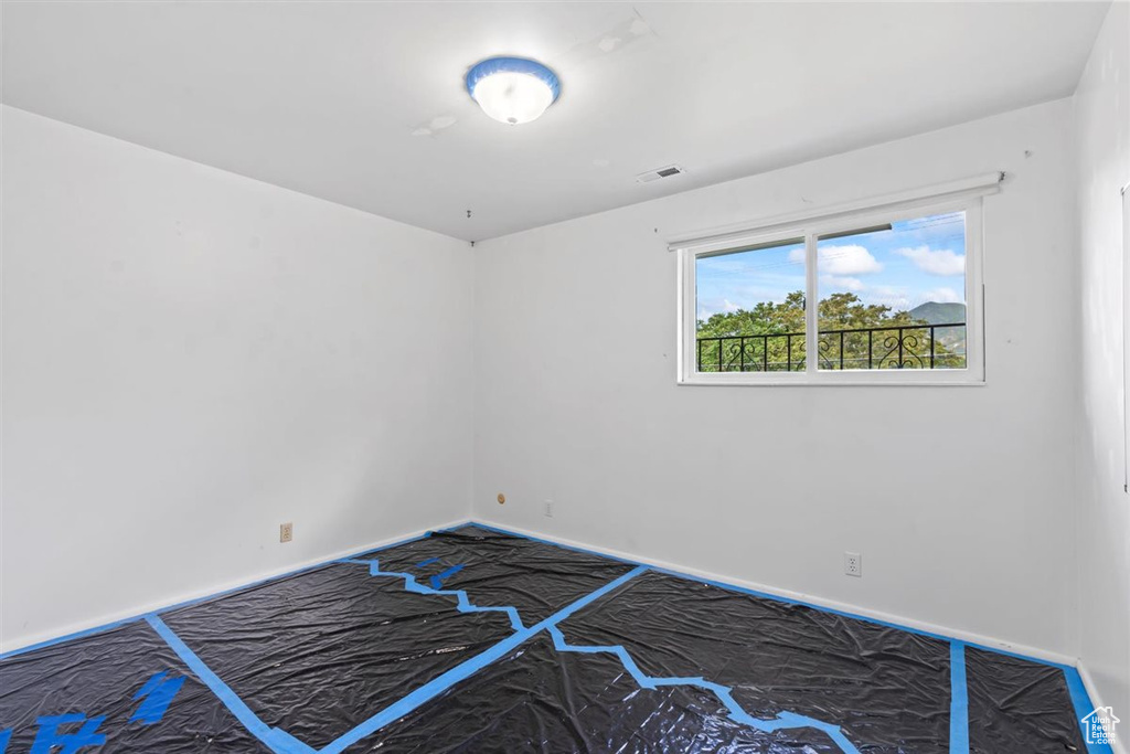 Unfurnished bedroom featuring baseboards