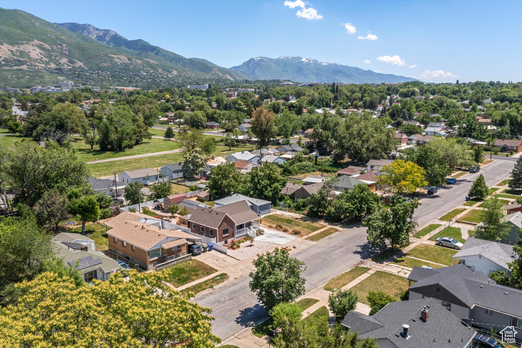 Aerial view of residential area with a mountain backdrop