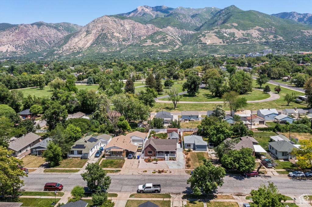 Aerial view of residential area featuring mountains