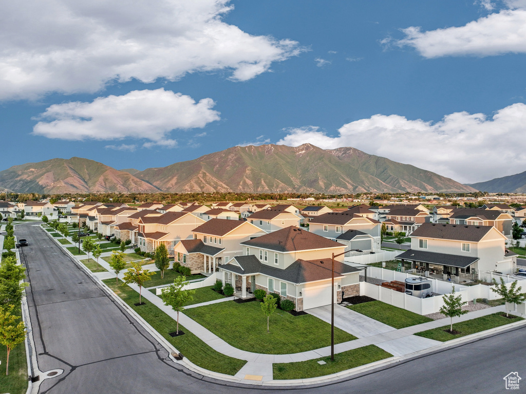 View of mountain backdrop with nearby suburban area