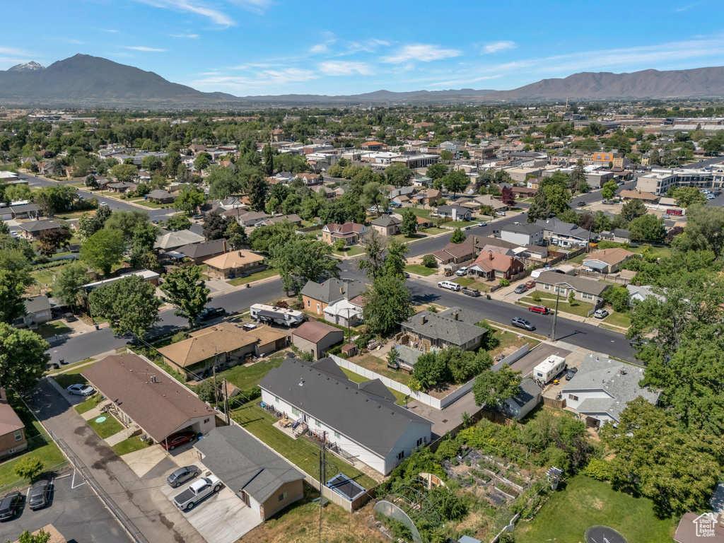 View of property location featuring a mountainous background and nearby suburban area