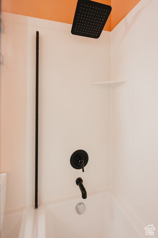 Bathroom view of shower / tub combination