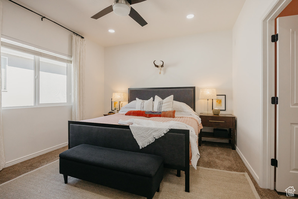 Bedroom featuring carpet floors, ceiling fan, and recessed lighting
