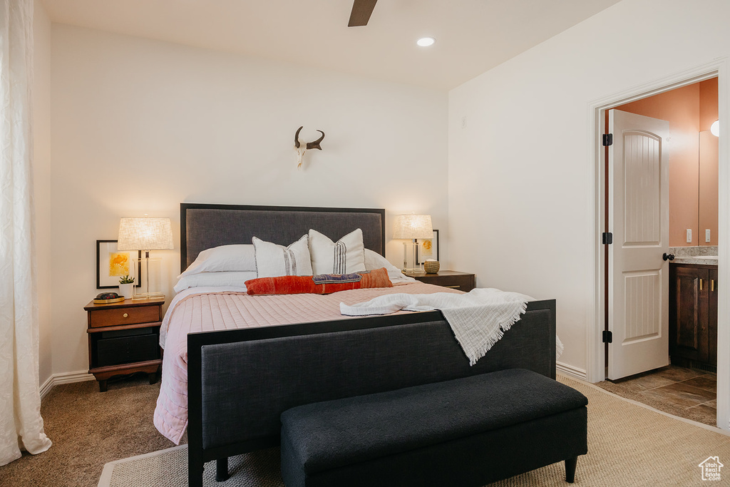 Bedroom with light colored carpet, a ceiling fan, and recessed lighting
