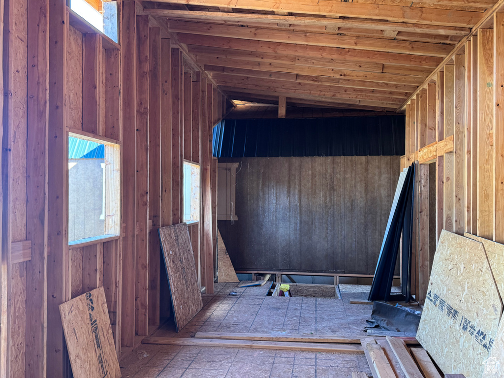 Misc room featuring wooden walls