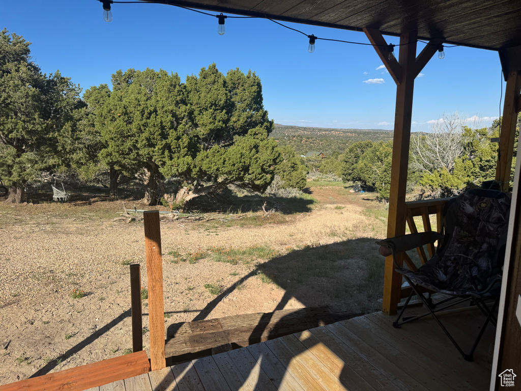 View of yard with a deck