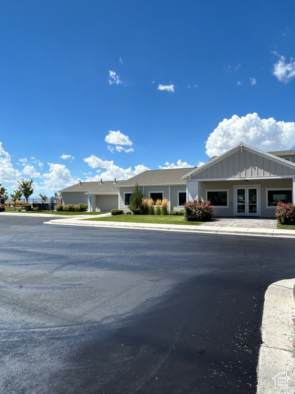 View of asphalt road featuring sidewalks