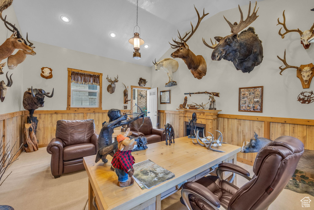Office with wainscoting, wood walls, carpet floors, recessed lighting, and lofted ceiling