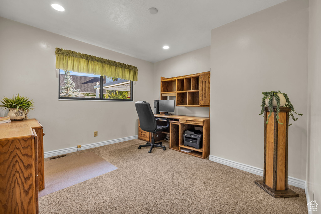 Office with carpet floors, baseboards, and recessed lighting