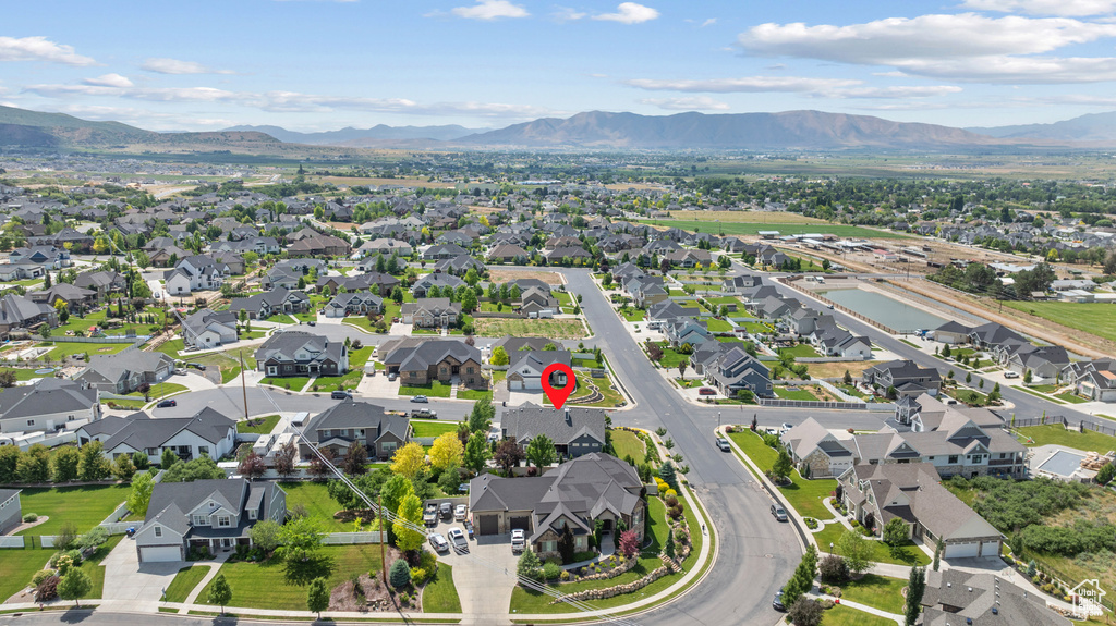 Aerial perspective of suburban area featuring mountains