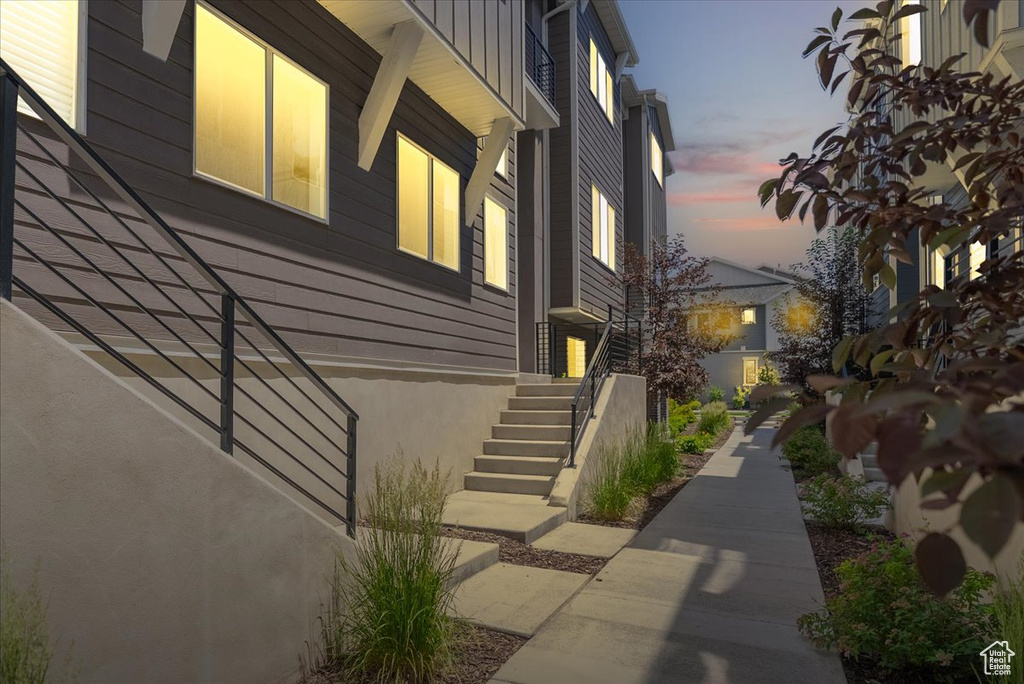 Property exterior at dusk featuring board and batten siding