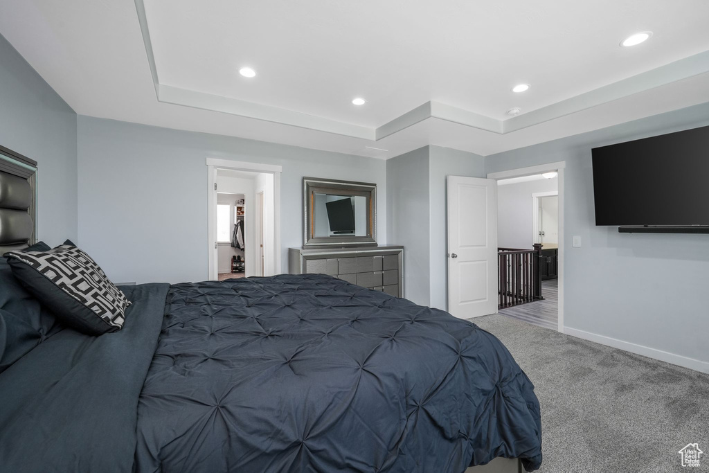 Carpeted bedroom featuring recessed lighting and baseboards