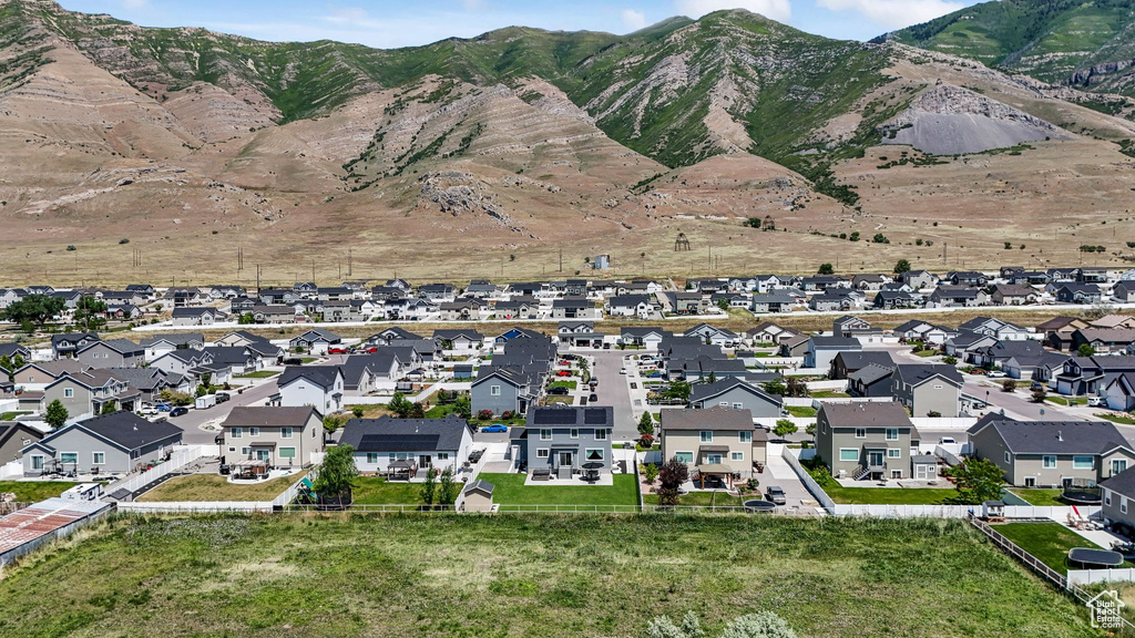 View of property location with nearby suburban area and mountains