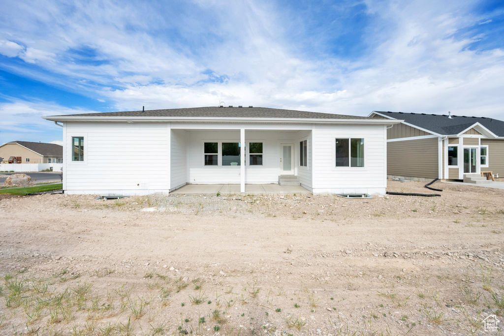 Back of property with entry steps
