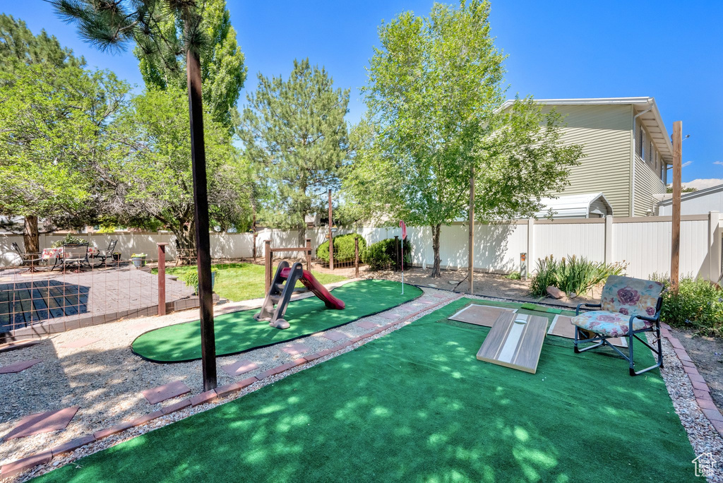 View of community featuring a putting green