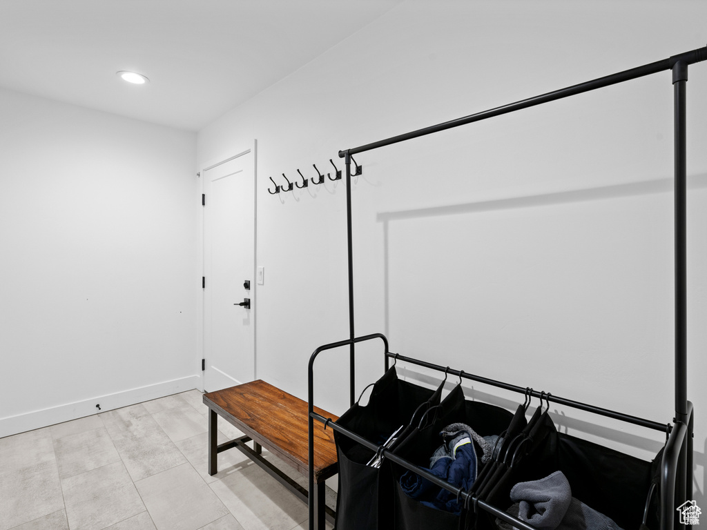 Bedroom with recessed lighting and baseboards