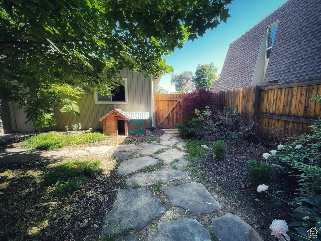 View of yard with a gate