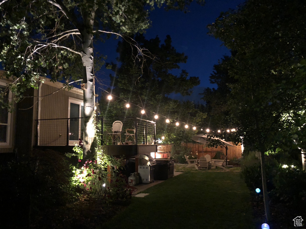 View of yard at twilight