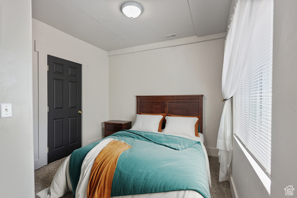 Bedroom featuring carpet floors