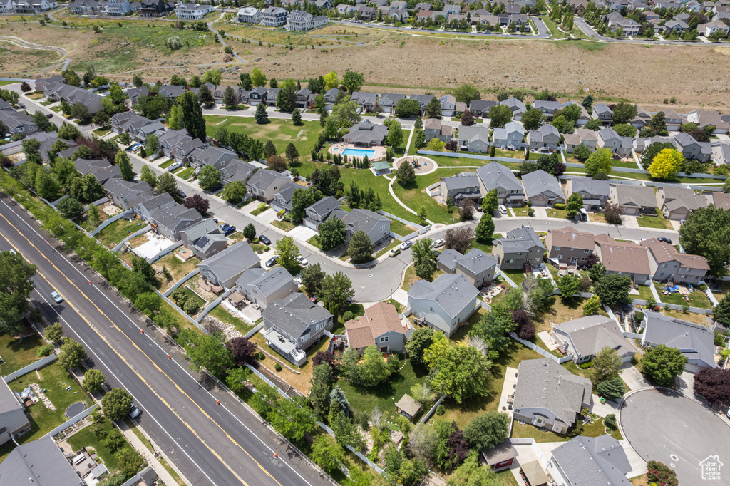 Aerial overview of property\'s location featuring nearby suburban area