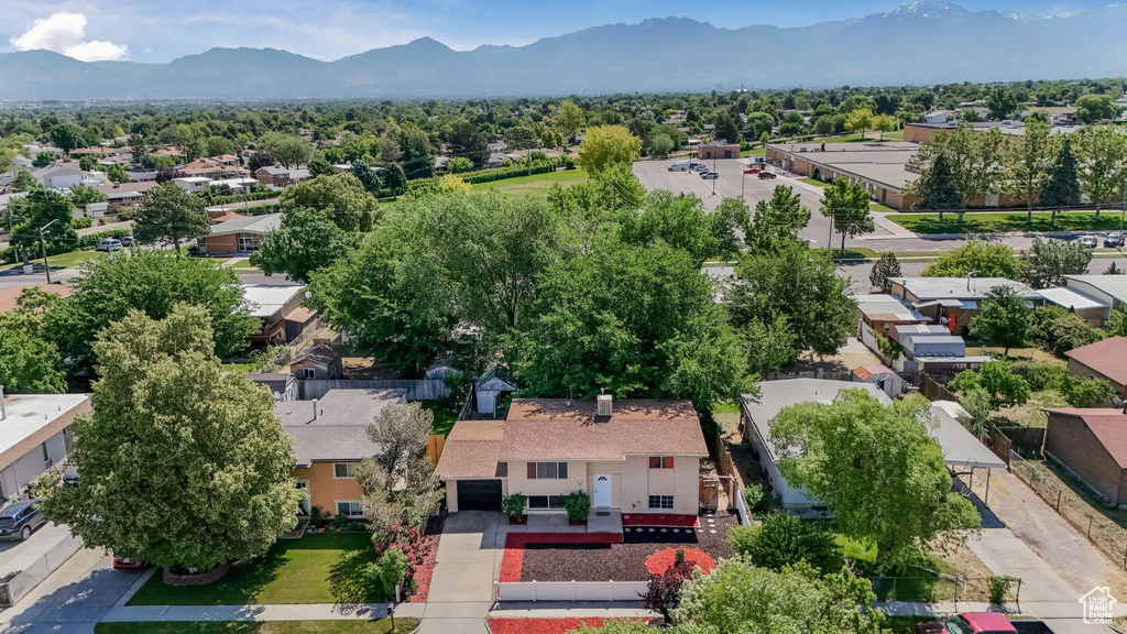 Aerial view of residential area with a mountain backdrop