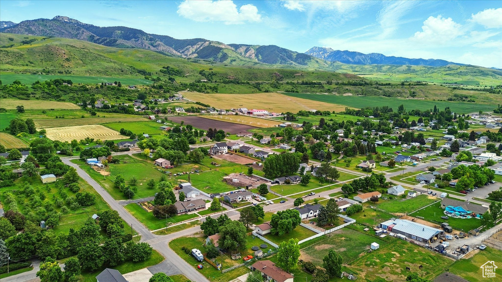 View of property location featuring a mountain backdrop and rural landscape