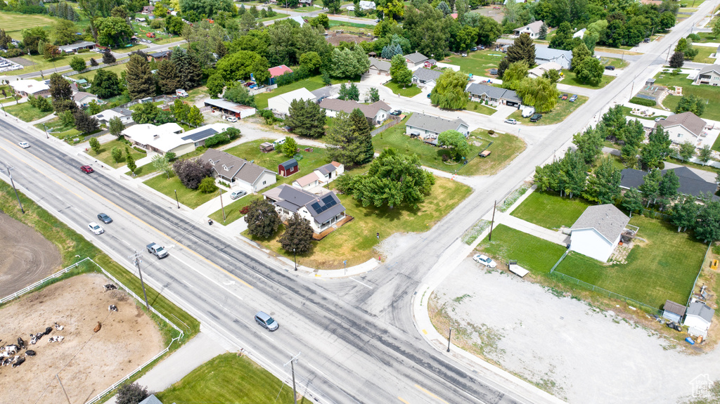 Aerial perspective of suburban area featuring a main thoroughfare