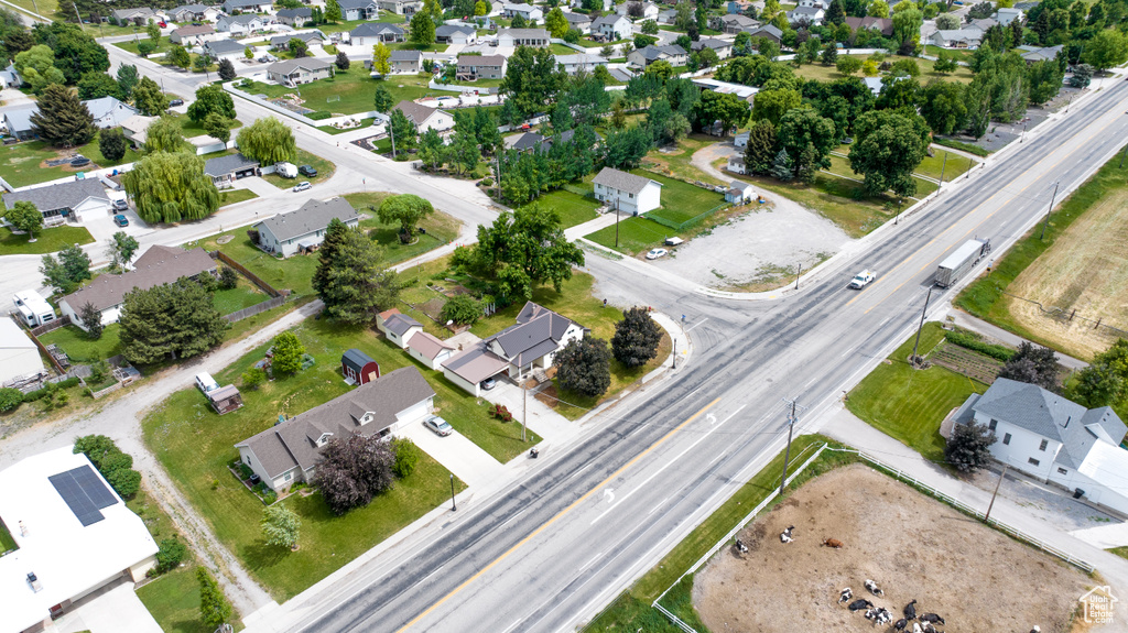 Aerial view of property's location with nearby suburban area