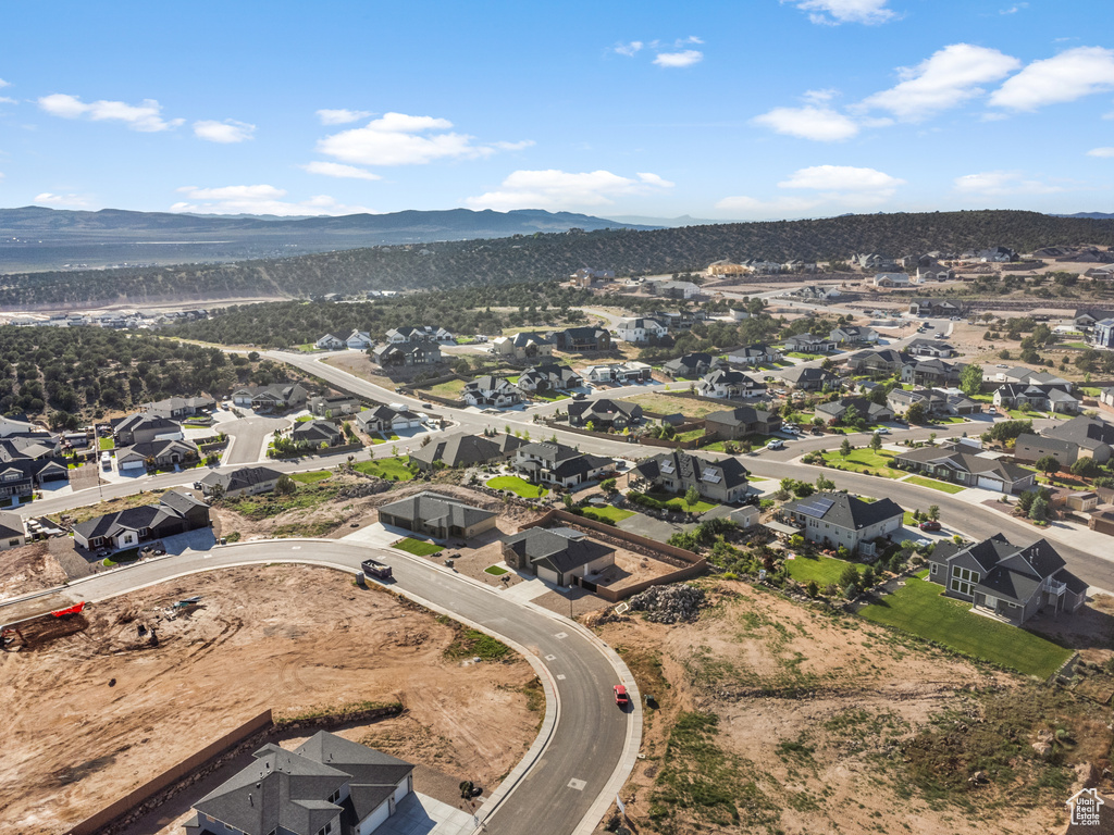 Aerial view of residential area with mountains