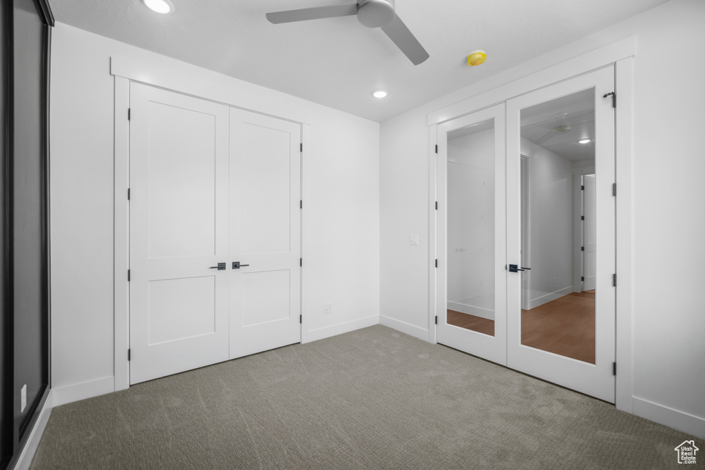 Unfurnished bedroom featuring carpet flooring, recessed lighting, and ceiling fan